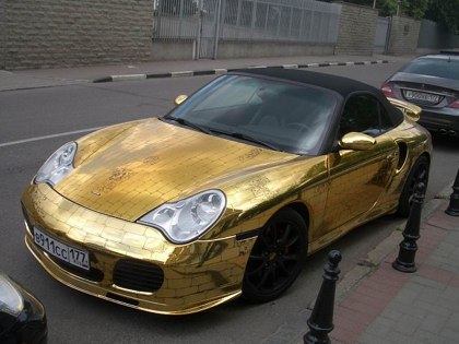 Pictures Cars on Please See By Yourself The Pictures Of The Gold Covered Porsche