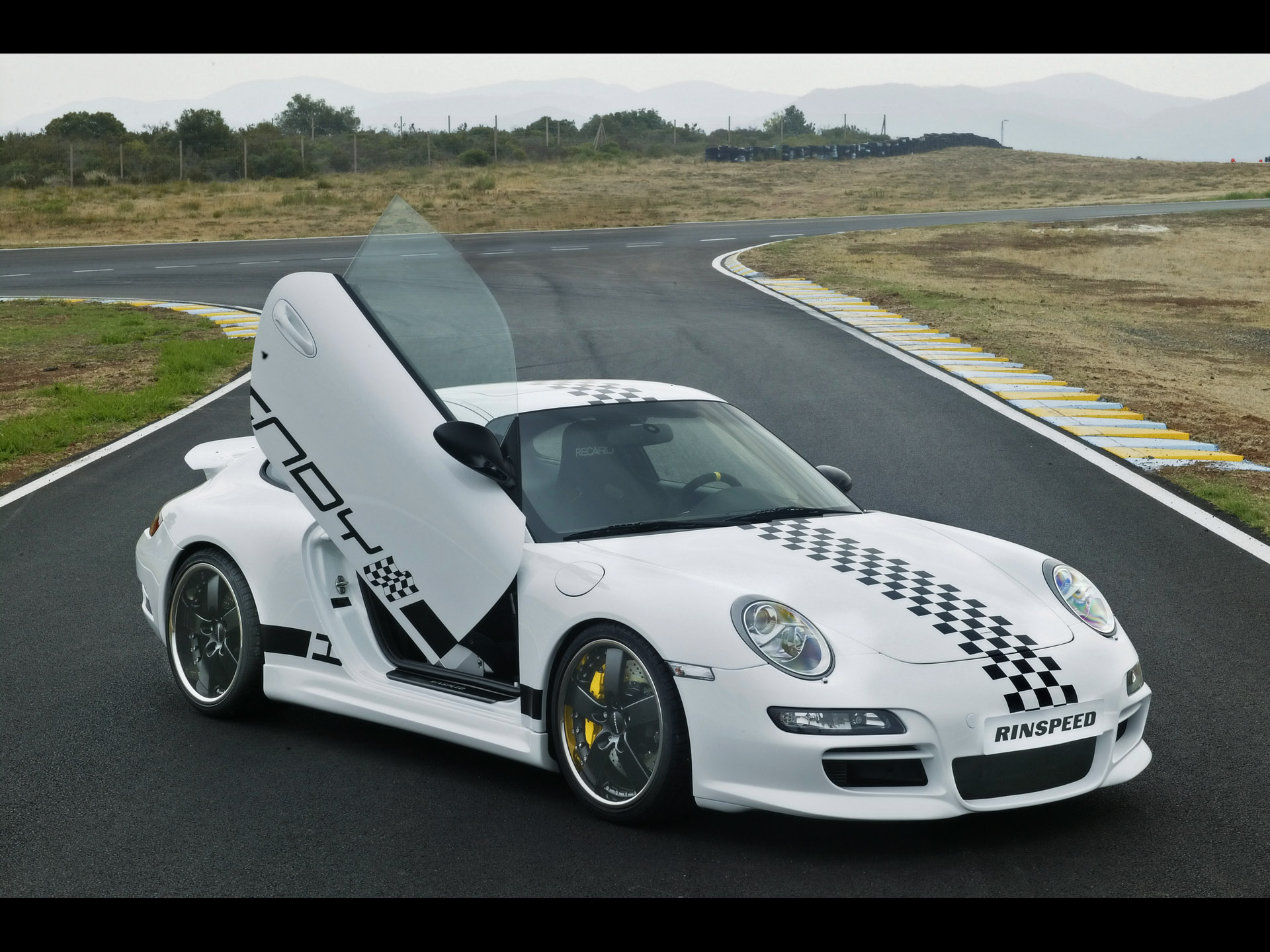 nice photo of a white racing car