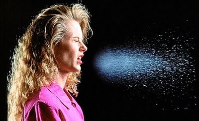 woman sneezing