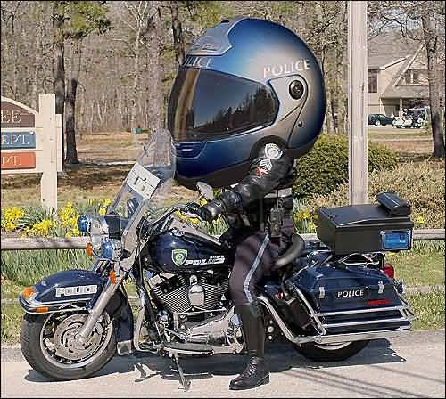 Funny policeman on bike