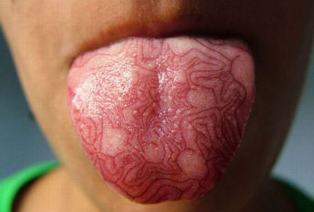 weird tongue tattoo